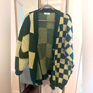 Cozy green checkered sweater